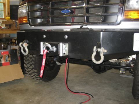 1996 Ford Bronco - Front view of a Ford Bronco with an aftermarket bumper and winch installed.
