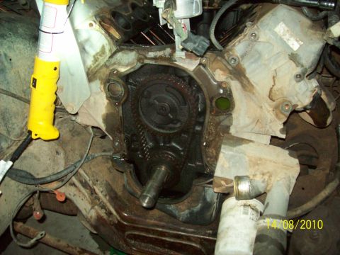 1985 Ford Bronco - Close-up view of an engine's internal timing components with the cover removed.