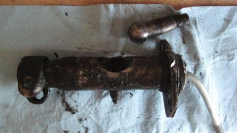 1968 Ford Ranchero - This appears to be a used engine or transmission component, possibly a linkage or actuator, with a separate bolt.