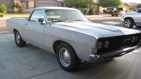 1968 Ford Ranchero - This 1968 Ford Ranchero is shown in a primer gray finish, parked in a driveway.