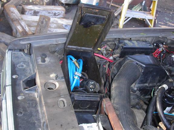 Having the batteries out back made some room for an old ammo box for storing miscellaneous items.