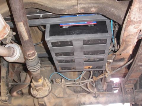 1990 Ford Bronco II - Battery carrier seen from underneath. With the large hole cut in the floorboard, I ran a brace underneath the floor to restore the floor's…