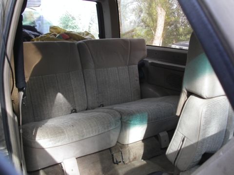 1990 Ford Bronco II - Battery hatch closed and seat deployed for use.