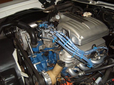 1973 Ford Ranchero - Close-up view of a vehicle's engine bay, showing various components and wiring.