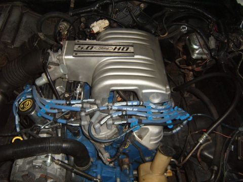 1973 Ford Ranchero - Engine bay detail showing a Ford 5.0 HO intake manifold and associated wiring.