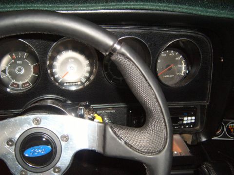 1973 Ford Ranchero - Interior view of a 1973 Ford Ranchero dashboard, showing gauges and steering wheel.