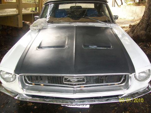 1968 Ford Mustang - Front view of a 1968 Ford Mustang, undergoing preparation for a paint job.