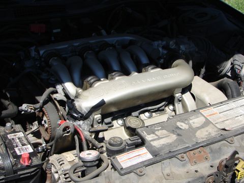 1992 Ford Taurus - Close-up view of the engine bay, highlighting the SHO 3.0L 24-valve intake manifold.