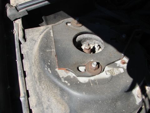 1992 Ford Taurus - This photo shows a close-up of a vehicle's strut mount area, not a 1992 Ford Taurus.