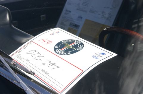 1968 Shelby GT500 - A show card for a Mustang Club of America event is displayed on the dashboard of a car.