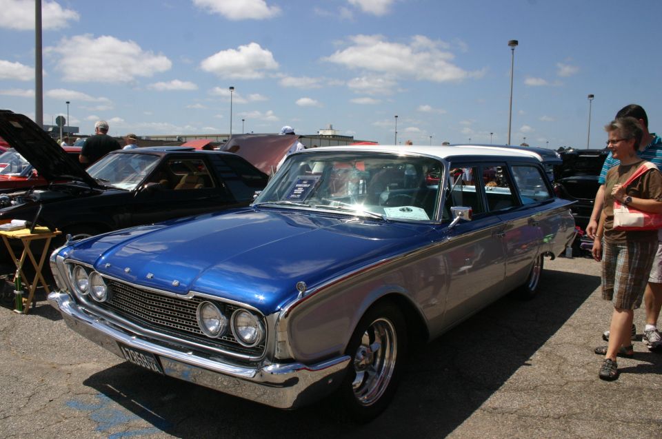 Blue and silver station wagon, front 3/4 view