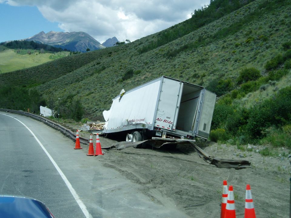Tractor-trailer crashed off the side of a mountain road