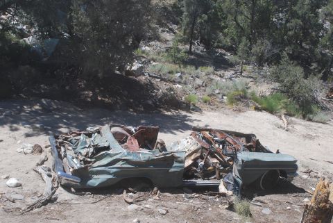 1996 Ford Bronco - This heavily damaged vehicle appears to be from the 1950s, not a 1996 Ford Bronco.