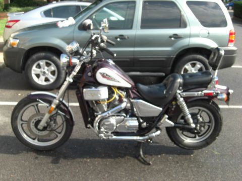1986 Honda Shadow Aero - 1986 Honda Shadow Aero motorcycle parked next to a silver SUV.