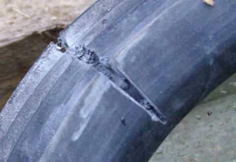 1979 Ford Bronco - Tire sidewall shows significant damage and a large cut.