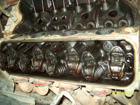 1985 Ford Bronco - Close-up view of an engine's internal components, revealing the valve train mechanism.