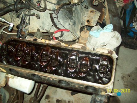1985 Ford Bronco - Close-up view of the internal components of an engine's cylinder head, showing the valve train assembly.
