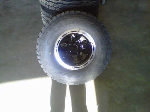 1994 Ford F-150 - A single tire and wheel assembly is shown, with text 'ION ALLOY' visible on the wheel.