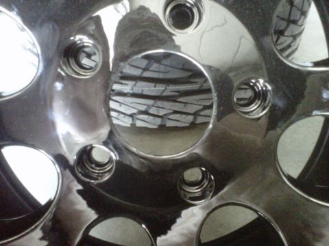 1994 Ford F-150 - The front grille and headlights of a truck are visible in this close-up photo.