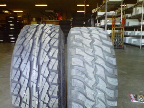 1994 Ford F-150 - A comparison of two different tire tread patterns is shown, highlighting variations in design for different driving conditions.
