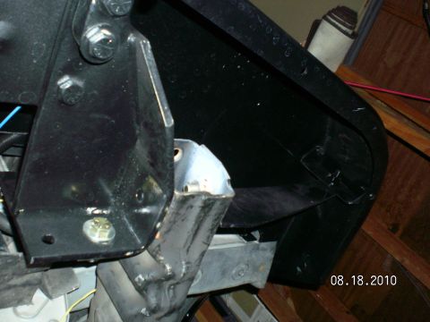 1996 Ford Bronco - Close-up view of a vehicle's intake system component, showing mounting hardware and plastic housing.