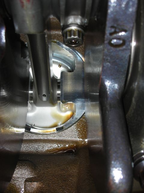 1992 Ford Crown Victoria - Engine internals showing crankshaft, connecting rod, and piston. "AO" marking visible on component.