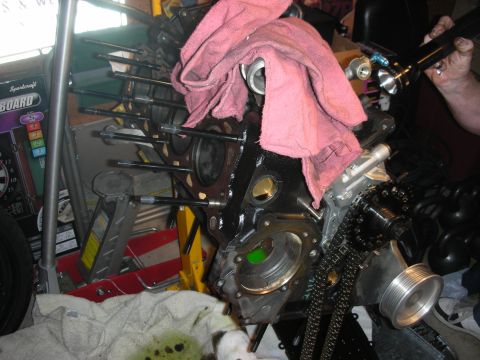1992 Ford Crown Victoria - Engine block assembly in progress, showing internal components and a timing chain mechanism.