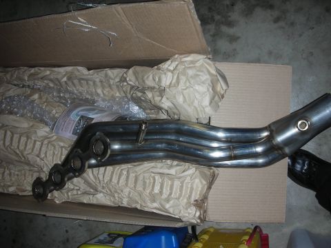 1992 Ford Crown Victoria - New exhaust headers, likely for an engine rebuild, packed in a box.