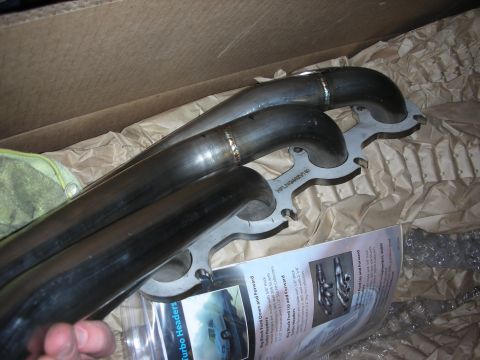 1992 Ford Crown Victoria - Close-up of new exhaust headers, likely for a performance engine build.