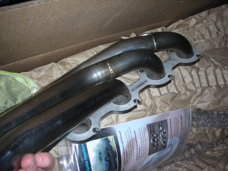 exhaust headers in a box with packaging