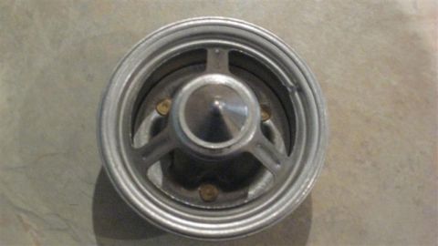 1968 Ford Ranchero - A single custom wheel is shown, a polished lip and a distinctive three-spoke design with a pointed center cap.