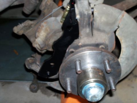 1979 Ford Ranchero - Cut down Ranchero hub to fit inside of Crown Vic rotor "hat", note the wheel stud shoulder that protrudes proud of the hub face, these help…