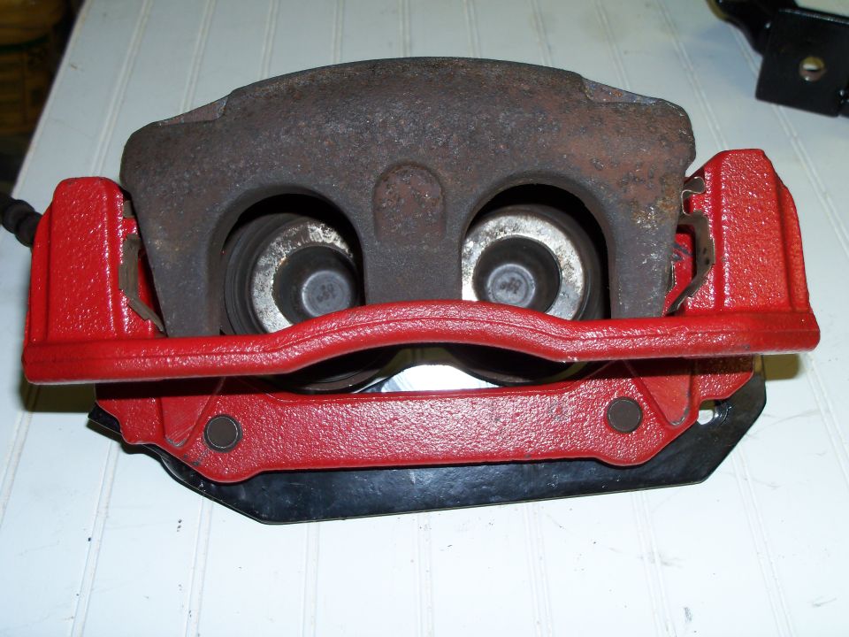 The caliper is offset somewhat on the bracket but once installed the rotor lines up perfectly with the brake pads, about a 1/16" of the rotor is above the pads once installed. New caliper,  mounting bracket and associated hardware will be used once the fabricating is done.
