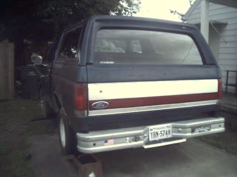1989 Ford Bronco - This 1989 Ford Bronco features a distinctive tri-color stripe on its rear panel and a Virginia license plate.