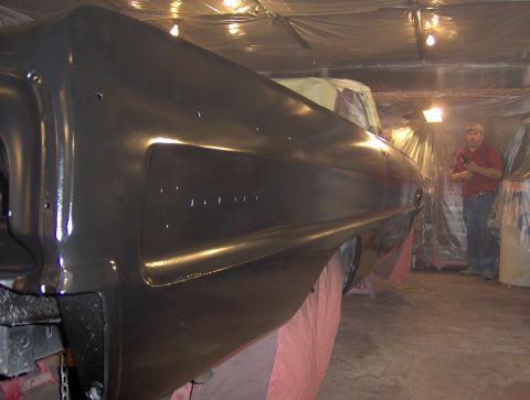 1964 Chevrolet Impala - 1964 Chevrolet Impala fender in a paint booth, ready for its final coat.