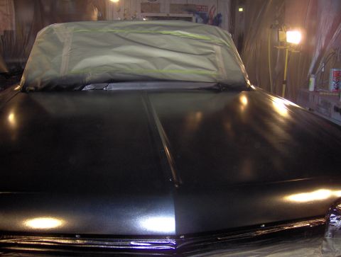 1964 Chevrolet Impala - A car is being prepped for painting in a workshop, with the hood and roof covered.