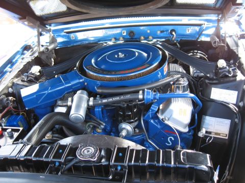 1968 Shelby GT500 - The engine bay features a blue Cobra Jet air cleaner and a detailed view of the engine components.