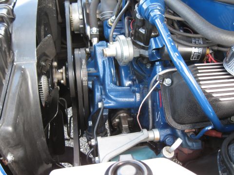 1968 Shelby GT500 - Detailed view of an engine bay, focusing on the fan and belt system.