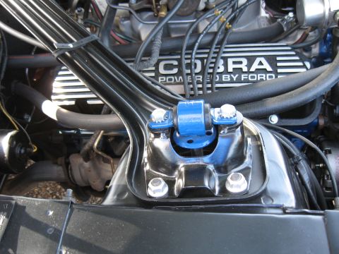 1968 Shelby GT500 - The engine bay features a blue strut tower brace and a Cobra valve cover indicating it's powered by Ford.
