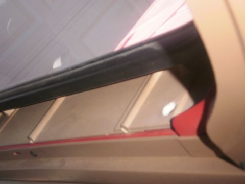 1991 Ford Bronco - Interior detail shot showing the window channel and trim pieces.