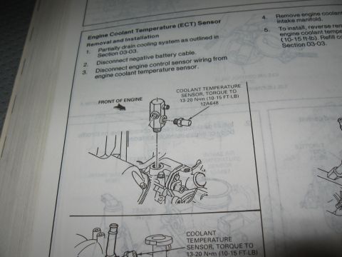 1994 Ford Bronco - Ford service procedure for engine coolant temperature sensor removal and installation with torque note and engine figure.
