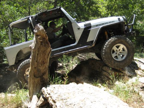 2005 Jeep Wrangler - 2005 Jeep Wrangler Rubicon navigating a difficult off-road obstacle.
