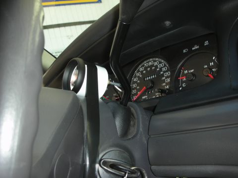 2004 Ford Crown Victoria - Aftermarket tachometer installed in a 2004 Ford Crown Victoria's interior.