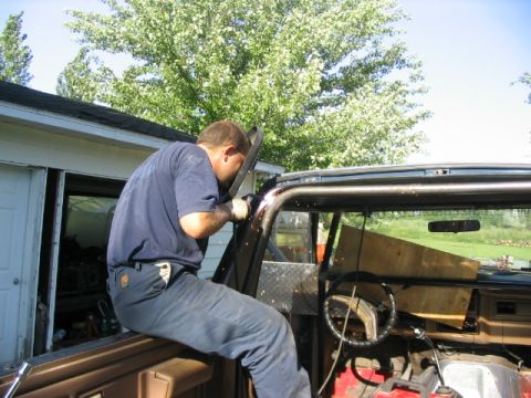 1986 Ford Bronco - Welding a custom roll cage into the interior of a vehicle.
