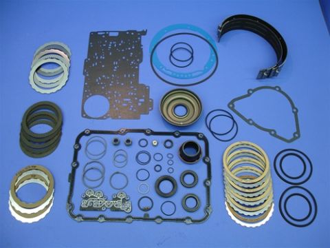 1990 Ford Bronco - Transmission rebuild kit laid out on a blue background.