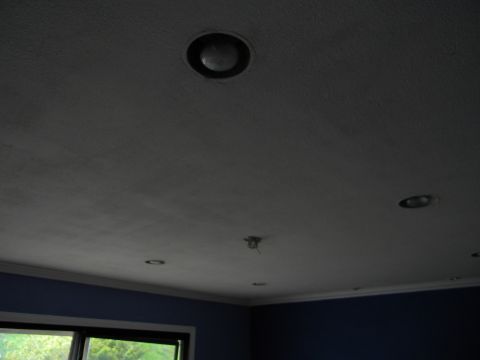 1992 Ford Bronco - Interior view of a ceiling with multiple recessed lights and a blue wall visible at the bottom.