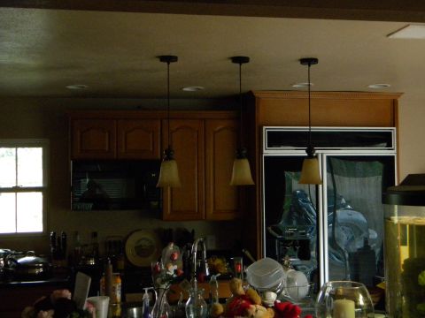 1992 Ford Bronco - Interior view of a kitchen showing cabinets, appliances, and a sink area.