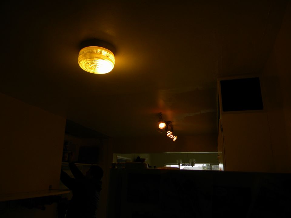 Interior ceiling light fixture with yellow glow