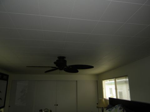 1992 Ford Bronco - Interior shot showing a ceiling fan and part of a room with sliding doors and a window.