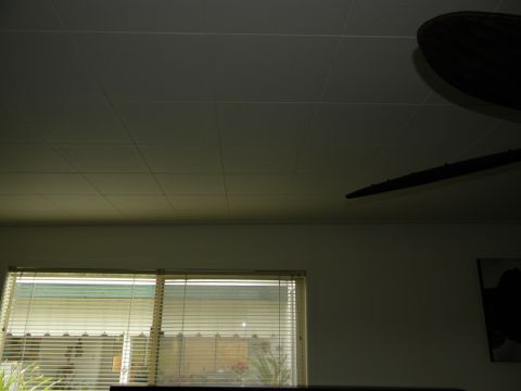 1992 Ford Bronco - This image shows an interior scene with blinds covering the windows and a ceiling fan overhead.